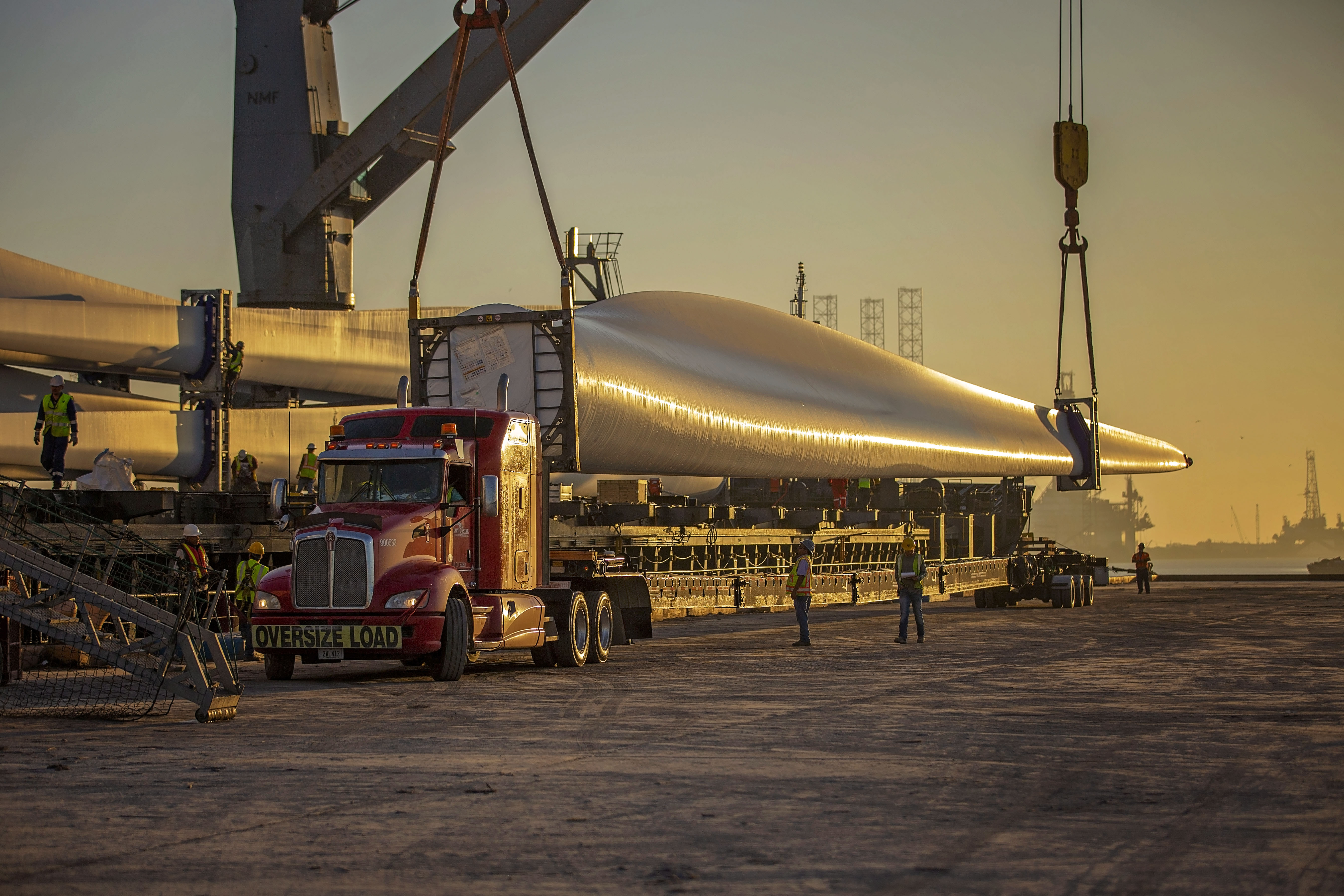 Windmill component loaded on to truck for transport